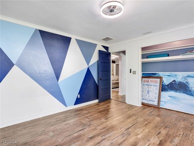 Beautiful 4-bedroom, 2-bath pool home in the highly desirable on Cypress Lake Country Club in Florida - for sale on GolfHomes.com, golf home, golf lot