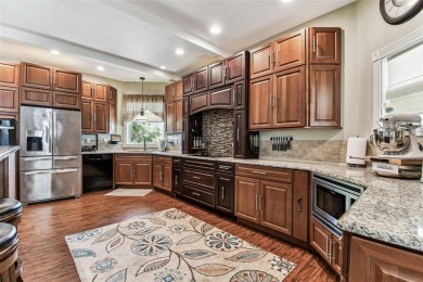 Nestled on a beautifully positioned corner lot directly across on Clearwater Country Club in Florida - for sale on GolfHomes.com, golf home, golf lot