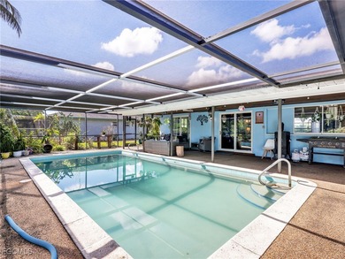 Beautiful 4-bedroom, 2-bath pool home in the highly desirable on Cypress Lake Country Club in Florida - for sale on GolfHomes.com, golf home, golf lot