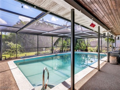 Beautiful 4-bedroom, 2-bath pool home in the highly desirable on Cypress Lake Country Club in Florida - for sale on GolfHomes.com, golf home, golf lot