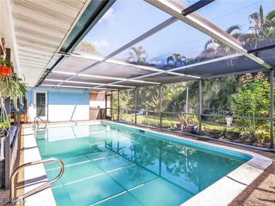 Beautiful 4-bedroom, 2-bath pool home in the highly desirable on Cypress Lake Country Club in Florida - for sale on GolfHomes.com, golf home, golf lot