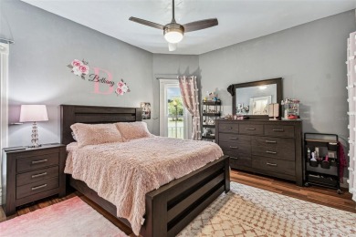 Nestled on a beautifully positioned corner lot directly across on Clearwater Country Club in Florida - for sale on GolfHomes.com, golf home, golf lot