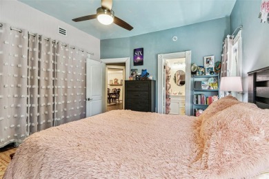 Nestled on a beautifully positioned corner lot directly across on Clearwater Country Club in Florida - for sale on GolfHomes.com, golf home, golf lot