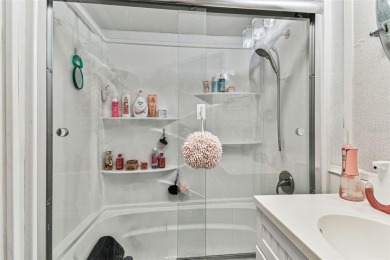 Nestled on a beautifully positioned corner lot directly across on Clearwater Country Club in Florida - for sale on GolfHomes.com, golf home, golf lot