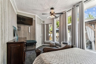 Nestled on a beautifully positioned corner lot directly across on Clearwater Country Club in Florida - for sale on GolfHomes.com, golf home, golf lot