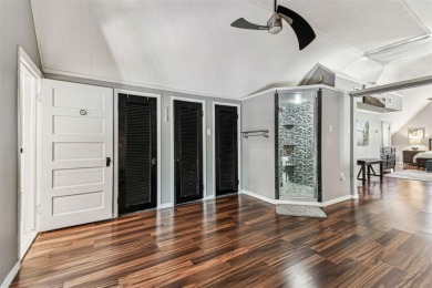 JUST REDUCED! Nestled on a beautifully positioned corner lot on Clearwater Country Club in Florida - for sale on GolfHomes.com, golf home, golf lot