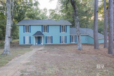 Enjoy private Creek living with this 4 bedroom 2.5 bath custom on Lake Forest Yacht and Country Club in Alabama - for sale on GolfHomes.com, golf home, golf lot