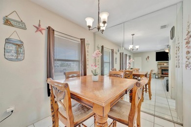 Charming fully furnished Bradenton home featuring 2 bedrooms, 1 on Bradenton Country Club in Florida - for sale on GolfHomes.com, golf home, golf lot