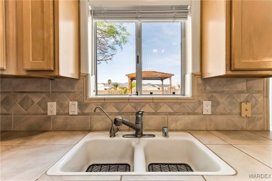 CUSTOM 3 BEDROOM, 3 BATH HOME NESTLED ON .43 ACRE LOT WITH BOAT on Desert Lakes Golf Course in Arizona - for sale on GolfHomes.com, golf home, golf lot