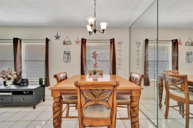 Charming fully furnished Bradenton home featuring 2 bedrooms, 1 on Bradenton Country Club in Florida - for sale on GolfHomes.com, golf home, golf lot