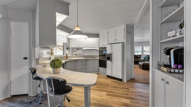 Trade your lawn mower for a fishing pole! This 55+ Lakeland on Wedgewood Golf Club in Florida - for sale on GolfHomes.com, golf home, golf lot