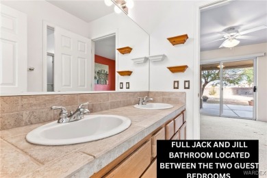 CUSTOM 3 BEDROOM, 3 BATH HOME NESTLED ON .43 ACRE LOT WITH BOAT on Desert Lakes Golf Course in Arizona - for sale on GolfHomes.com, golf home, golf lot