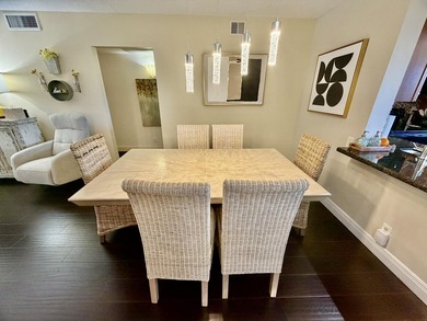 WELCOME to easy FLORIDA living in this uniquely enhanced 2/2 on Wynmoor Golf Course in Florida - for sale on GolfHomes.com, golf home, golf lot