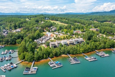 Lake Keowee and the Blue Ridge Mountains offer a serene backdrop on The Reserve At Lake Keowee in South Carolina - for sale on GolfHomes.com, golf home, golf lot