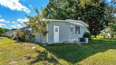 Trade your lawn mower for a fishing pole! This 55+ Lakeland on Wedgewood Golf Club in Florida - for sale on GolfHomes.com, golf home, golf lot
