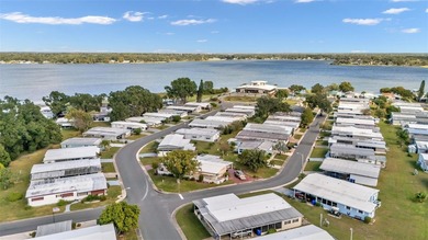 Trade your lawn mower for a fishing pole! This 55+ Lakeland on Wedgewood Golf Club in Florida - for sale on GolfHomes.com, golf home, golf lot