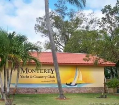 Welcome to your slice of paradise at MYCC. This charming 2 BR/2 on Monterey Yacht and Country Club in Florida - for sale on GolfHomes.com, golf home, golf lot