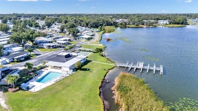 Trade your lawn mower for a fishing pole! This 55+ Lakeland on Wedgewood Golf Club in Florida - for sale on GolfHomes.com, golf home, golf lot