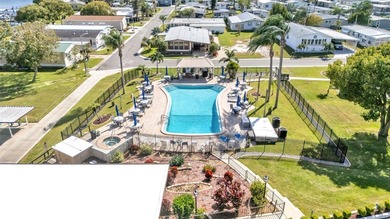 Trade your lawn mower for a fishing pole! This 55+ Lakeland on Wedgewood Golf Club in Florida - for sale on GolfHomes.com, golf home, golf lot