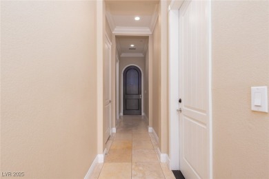 Indulge in Tuscan-inspired luxury at this Lake Las Vegas condo on Reflection Bay Golf Club in Nevada - for sale on GolfHomes.com, golf home, golf lot