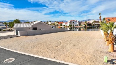 Rare 58-foot-wide waterfront lot on the middle lake in the on Los Lagos Golf Club in Arizona - for sale on GolfHomes.com, golf home, golf lot