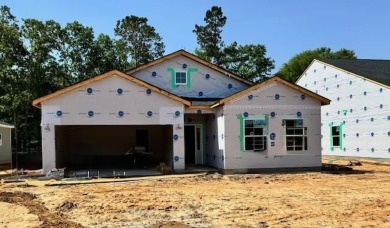 Enjoy one-story living at its finest in the Durham floorplan on Players Course At Wyboo Plantation in South Carolina - for sale on GolfHomes.com, golf home, golf lot