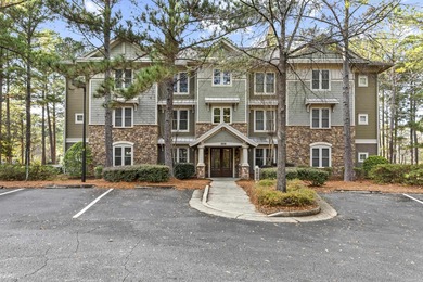 This wonderful condo is situated in the heart of Reynold's Lake on Reynolds Lake Oconee - The Oconee in Georgia - for sale on GolfHomes.com, golf home, golf lot