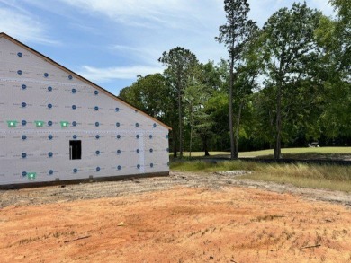 Your spacious cottage awaits in the Gwinnett C Floorplan.  This on Players Course At Wyboo Plantation in South Carolina - for sale on GolfHomes.com, golf home, golf lot