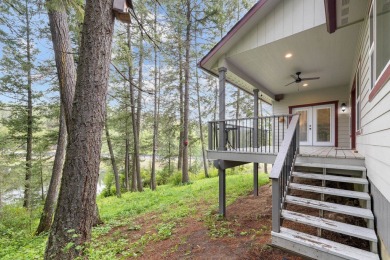 Discover lakefront living at its finest on Lake San Souci! This on Stoneridge Golf Club in Idaho - for sale on GolfHomes.com, golf home, golf lot