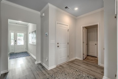 Your spacious cottage awaits in the Gwinnett C Floorplan.  This on Players Course At Wyboo Plantation in South Carolina - for sale on GolfHomes.com, golf home, golf lot