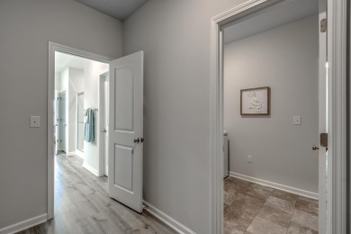 Your spacious cottage awaits in the Gwinnett C Floorplan.  This on Players Course At Wyboo Plantation in South Carolina - for sale on GolfHomes.com, golf home, golf lot