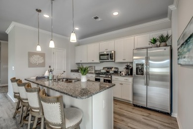 Your spacious cottage awaits in the Gwinnett C Floorplan.  This on Players Course At Wyboo Plantation in South Carolina - for sale on GolfHomes.com, golf home, golf lot