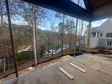 Welcome to 1040 Sunrise Court, a stunning new construction on Reynolds Lake Oconee - The Oconee in Georgia - for sale on GolfHomes.com, golf home, golf lot