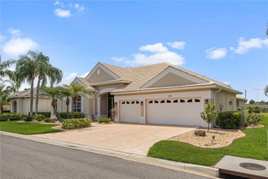 Nestled in the award winning Pelican Point Golf  Country Club on Pelican Pointe Golf and Country Club in Florida - for sale on GolfHomes.com, golf home, golf lot