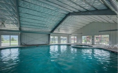 Discover lakefront living at its finest on Lake San Souci! This on Stoneridge Golf Club in Idaho - for sale on GolfHomes.com, golf home, golf lot