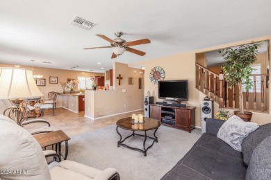 This expansive home overlooks the 9th hole of the golf course on Oasis Golf Club in Arizona - for sale on GolfHomes.com, golf home, golf lot