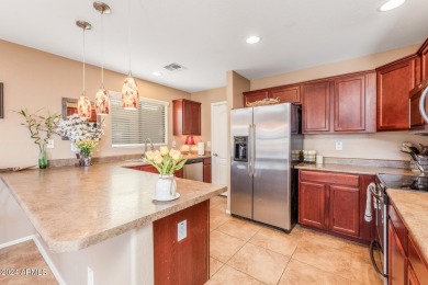 This expansive home overlooks the 9th hole of the golf course on Oasis Golf Club in Arizona - for sale on GolfHomes.com, golf home, golf lot