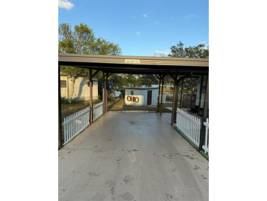NO LOT RENT, it is a deeded lot, 2 bedrooms 1-1/2 Baths on Tooke on Glen Lakes Country Club in Florida - for sale on GolfHomes.com, golf home, golf lot