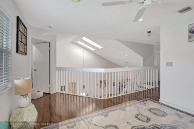 Beautiful 3BR/2.5BA townhouse with stunning golf and lake views on Woodmont Country Club in Florida - for sale on GolfHomes.com, golf home, golf lot