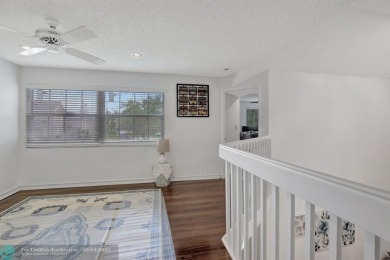 Beautiful 3BR/2.5BA townhouse with stunning golf and lake views on Woodmont Country Club in Florida - for sale on GolfHomes.com, golf home, golf lot