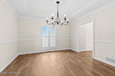 Imagine waking up, coffee in hand on your covered back deck on Eagle Creek Golf Course in Kentucky - for sale on GolfHomes.com, golf home, golf lot