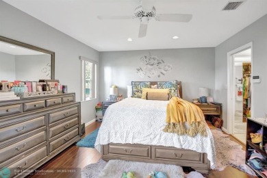 Beautiful 3BR/2.5BA townhouse with stunning golf and lake views on Woodmont Country Club in Florida - for sale on GolfHomes.com, golf home, golf lot