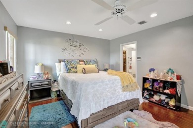 Beautiful 3BR/2.5BA townhouse with stunning golf and lake views on Woodmont Country Club in Florida - for sale on GolfHomes.com, golf home, golf lot