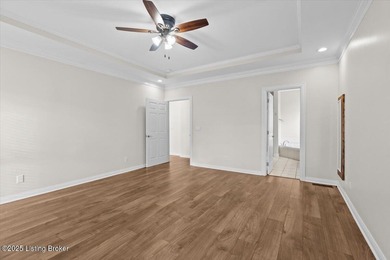 Imagine waking up, coffee in hand on your covered back deck on Eagle Creek Golf Course in Kentucky - for sale on GolfHomes.com, golf home, golf lot