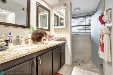 Beautiful 3BR/2.5BA townhouse with stunning golf and lake views on Woodmont Country Club in Florida - for sale on GolfHomes.com, golf home, golf lot