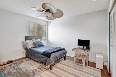 Beautiful 3BR/2.5BA townhouse with stunning golf and lake views on Woodmont Country Club in Florida - for sale on GolfHomes.com, golf home, golf lot