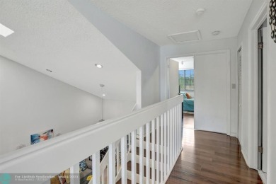 Beautiful 3BR/2.5BA townhouse with stunning golf and lake views on Woodmont Country Club in Florida - for sale on GolfHomes.com, golf home, golf lot