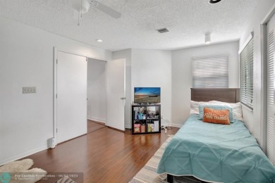 Beautiful 3BR/2.5BA townhouse with stunning golf and lake views on Woodmont Country Club in Florida - for sale on GolfHomes.com, golf home, golf lot