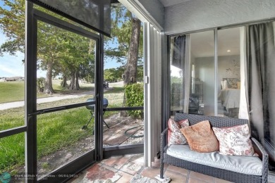 Beautiful 3BR/2.5BA townhouse with stunning golf and lake views on Woodmont Country Club in Florida - for sale on GolfHomes.com, golf home, golf lot