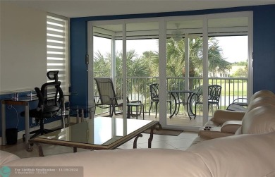 Your dream home with sweeping golf course and pond views! This on Palm-Aire Country Club and Resort - The Oaks in Florida - for sale on GolfHomes.com, golf home, golf lot